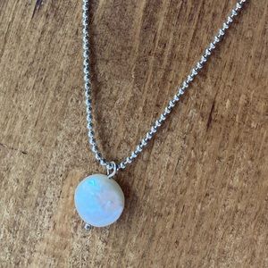 Pearl coin on silver chain. Necklace.